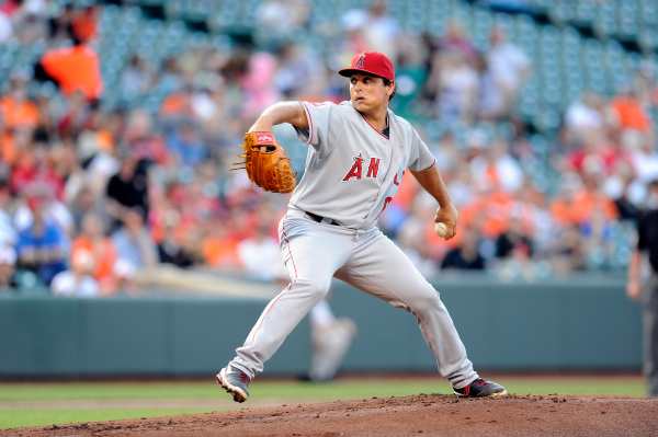Angels Southpaw Jason Vargas will miss about two weeks for surgery to have a blood clot removed. (G. Flume/Getty Images)